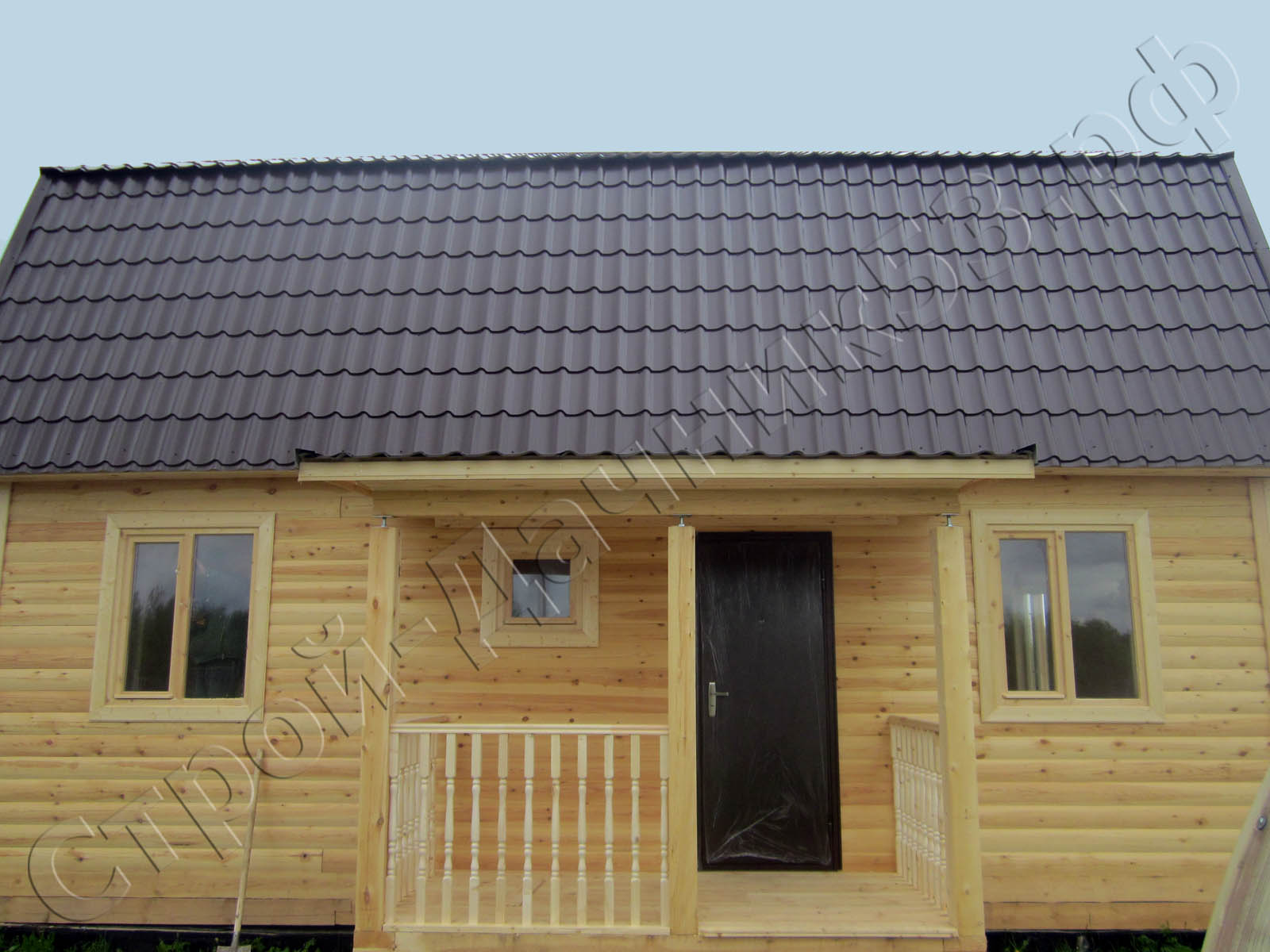 Вид дома со стороны террасы