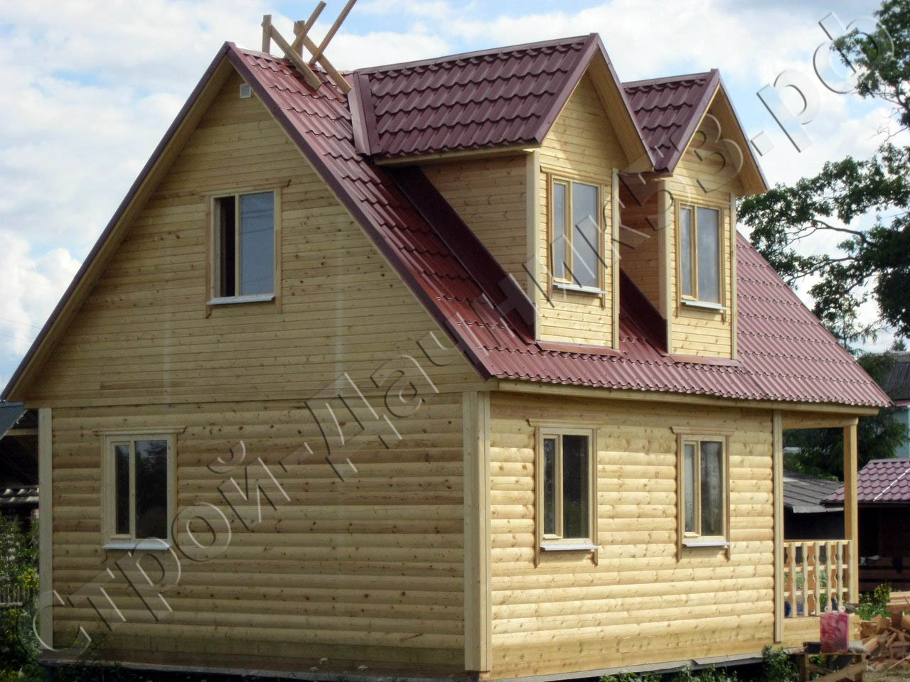 брусовой дом 6х8м 84 кв м с двумя кукушками на мансардном этаже и открытой террасой Лен обл Кингесепский р он